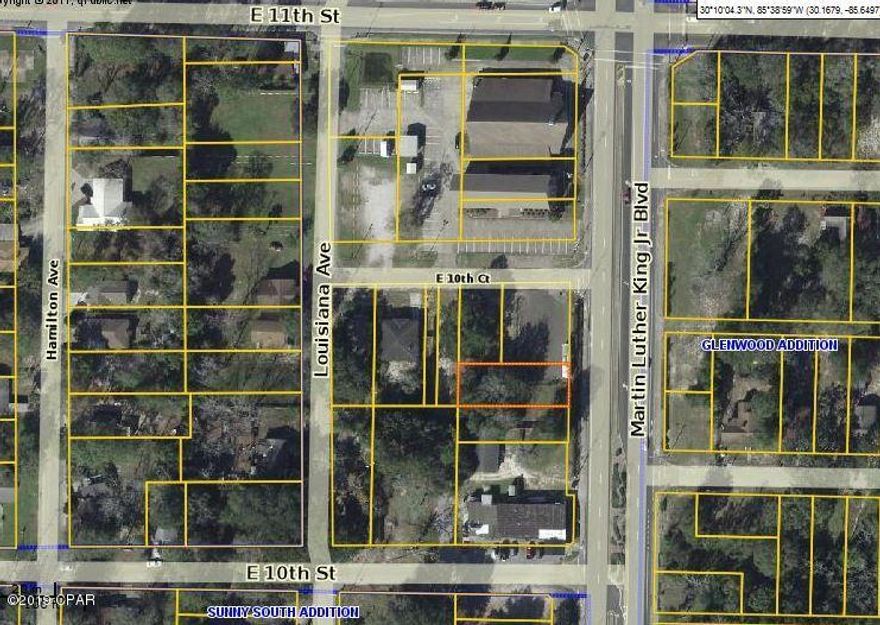 Drive by and check this parcel out! Great location for a small business. Located between St. John's Missionary Baptist Church and Steele Boys Bail Bonds. Facing the property, there are some purple hedges on the front border, a privacy fence on the south border, and a parking lot to the right of the north border. There are some downed trees on the back section of the parcel.