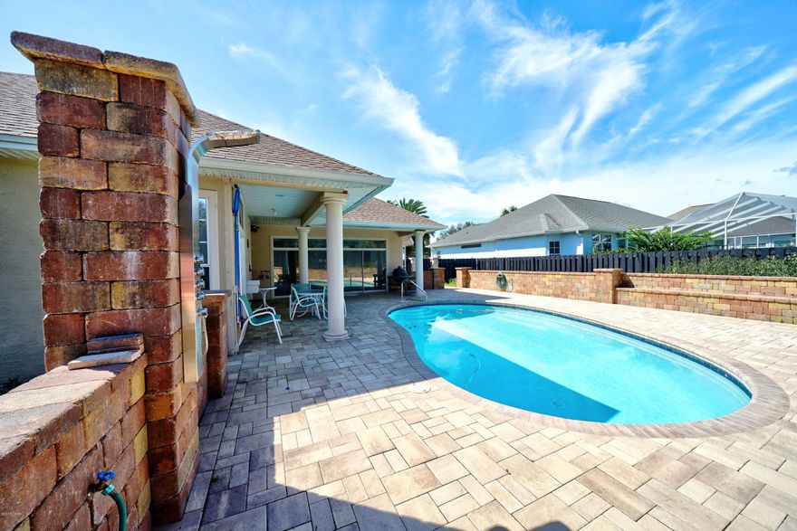 **OPEN HOUSE Saturday, OCT 6th from 11am-1pm **   Elegant home in the very desirable Palm Bay neighborhood. Large paver pool area with saltwater pool, outdoor shower and Green Egg grill, includes great views of private backyard area.  Open floor plan has large Great Room with built-in shelving, fireplace, and large screened TV. Spacious kitchen has large breakfast bar with quartz countertops, glass top stove and an eating area. The large Owners retreat looks out onto lovely pool area; master bedroom is large enough for a sitting area; master bath has jacuzzi tub, separate shower and double vanity. There are 2 additional bedrooms one of which includes a half bath, and a full bathroom with access to the pool area. A Two car garage with built in cabinets and work bench, and a paver driveway. Palm Bay is a highly desirable, family-friendly community close to the Navy base, schools, shopping, restaurants, marinas, and the beach! 

New A/C 2017
Washer and Dryer included
Termite Bond
Security camera system
Scotchshield Security window film.

Age, Square Footage, lot and room sizes approximate, if important please verify.