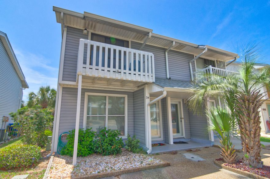 Great investment opportunity! This townhome is on the West-End of Panama City Beach; across the street from the Beach-peaceful atmosphere with a large deck facing a pond, end unit, short term rentals are ok. Low HOA fees, just $1300 a year. Community pool, shuffle board and a dog area for owners (only) in a sweet location. This unit needs a little updating but does come furnished. If you are looking for a beach property under $200,000 this is a nice option. Come check it out!