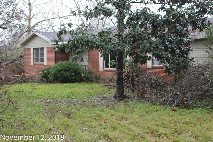 Brick home on 5 acres. The home has 3 bedrooms and 2 bathrooms, a formal living and a den.  This home was effected by Hurricane Michael but with the brick exterior, the large square footage and the size of the lot, there is good potential in this home.   This property may qualify for Seller Financing (Vendee) Due to the condition, the property may have health/safety risk(s) including, without limitation, illegal or industrial chemicals and substances and associated environments conditions, mold, mildew or fungus, high sulfer, content building materials, or other risks unknown to the Seller.  Prior to entry/access all parties must sign a Hold Harmless Agreement and the property may only be shown by appointment.  Property was built prior to 1978 and lead based paint potentially exist.