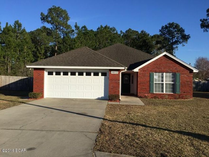 Charming Lynn Haven neighborhood in Magnolia Meadows...with street names like Rhett and Scarlett!  This contemporary brick home sits on a cul de sac and has a huge fenced back yard. The high ceilings and open floor plan contribute to the open, airy feel. The living room has engineered wood floors and a fireplace. The master suite has trey ceilings, double sinks and a large walk in closet. The spacious galley kitchen  is white and fresh and has a double porcelain sink. Great house in a great neighborhood!