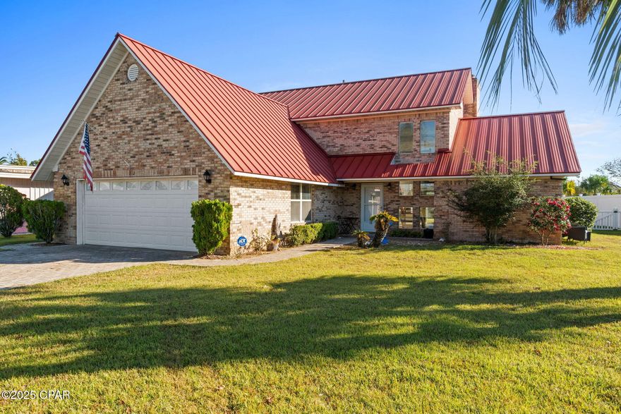 'CURRENTLY UNDER CONTRACT, SELLER WILL CONSIDER BACKUP OFFERS' Discover coastal elegance in this beautifully maintained 3 bedroom, 2.5 bath home located in the coveted Gulf Aire subdivision of St Joe Beach. Designed for comfort and style, this brick X FLOOD ZONE residence offers a spacious open living area with a cozy gas fireplace, formal dining space, and a bright sunroom with impact windows that fill the home with natural light. The kitchen provides generous counter space and storage, ideal for entertaining or family gatherings. Step outside to enjoy a lush lawn and a fenced backyard that offers both privacy and space to relax. The attached two car garage and ample driveway parking add convenience to everyday living. Residents of Gulf Aire enjoy exclusive access to a gated and locked private beach access, along with a community pool and tennis courts, all within a short walk from your front door. Experience coastal living where every day feels like a getaway. Schedule your private tour of 312 Beacon Road and see what makes Gulf Aire one of the most sought-after communities on St Joe Beach. HOA dues are only $30 per month!