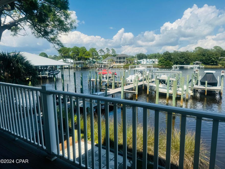 Experience the ultimate in waterfront living with this absolutely beautiful and cozy condo, offering stunning lagoon views. This meticulously updated 1-bedroom, 1-bathroom gem is perfectly situated right on the water. Enjoy relaxing on your balcony, sipping your favorite beverages while watching the fish leap in the serene lagoon. The condo also features a spacious storage room, ideal for all your boating and beach gear. Plus, you're just 3 blocks away from our gorgeous beaches! With this fantastic location and a slip included, this beachside paradise won't last long. Don't miss your chance to make it yours!