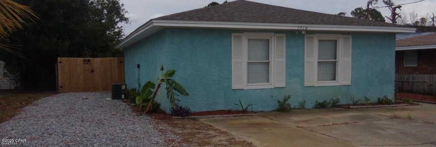 INVESTMENT OPPORTUNITY ALERT! This charming 2 bedroom, 2 bathroom beach home is perfectly positioned close to the sugar-white sands of Panama City Beach and zoned for SHORT-TERM RENTALS! Whether you're seeking a lucrative vacation rental property or your own beach retreat with income potential, this is the opportunity you've been waiting for.