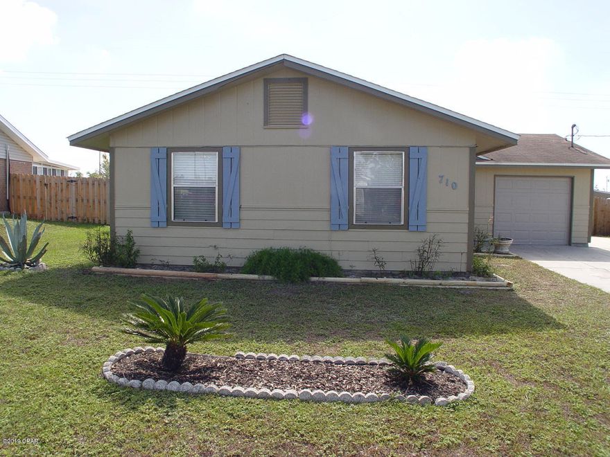 UPDATE: Seller just installed new HVAC Heat-Pump system 7 Jan 20. Beautifully restored hurricane Michael damaged home. Complete new exterior and interior paint, new vinyl plank flooring in the living room and new wall to wall carpet in the bedrooms. Kitchen, dining area and baths have existing ceramic tile flooring. New kitchen cabinets and counter tops with a new sink/fixtures, and dishwasher installed. Home has a whole house attic fan in hallway that allows you to open your windows a little and let the fan pull fresh air in through rooms and out providing some cool breezes in the spring and fall months or just run it for a while to air out the home. Fully fenced backyard, paved driveway with extra paved parking alongside the garage. Nice large covered back patio with large backyard. Existing stove and side/side refrigerator are in good condition and working well. The garage has a temperature controlled exhaust fan that kicks on during hot days to lower the garage temperature.