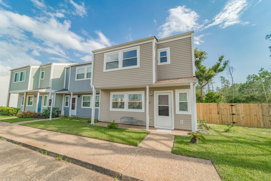 I love this end unit town home for so many reasons. 

This beautiful home has been recently updated with new flooring, fresh paint, new light fixtures, new appliances, new counters, new windows, new Roof, new Fence and no HOA fees. This desirable  end unit has a large, very oversized lot ( 63x165) that is partially fenced (great space for a large dog, swing set etc. The privacy of the back yard is wonderful and rare for this type of town home. The location of this community is great! It is close to shopping, entertainment and the Beach. come check this beauty out!