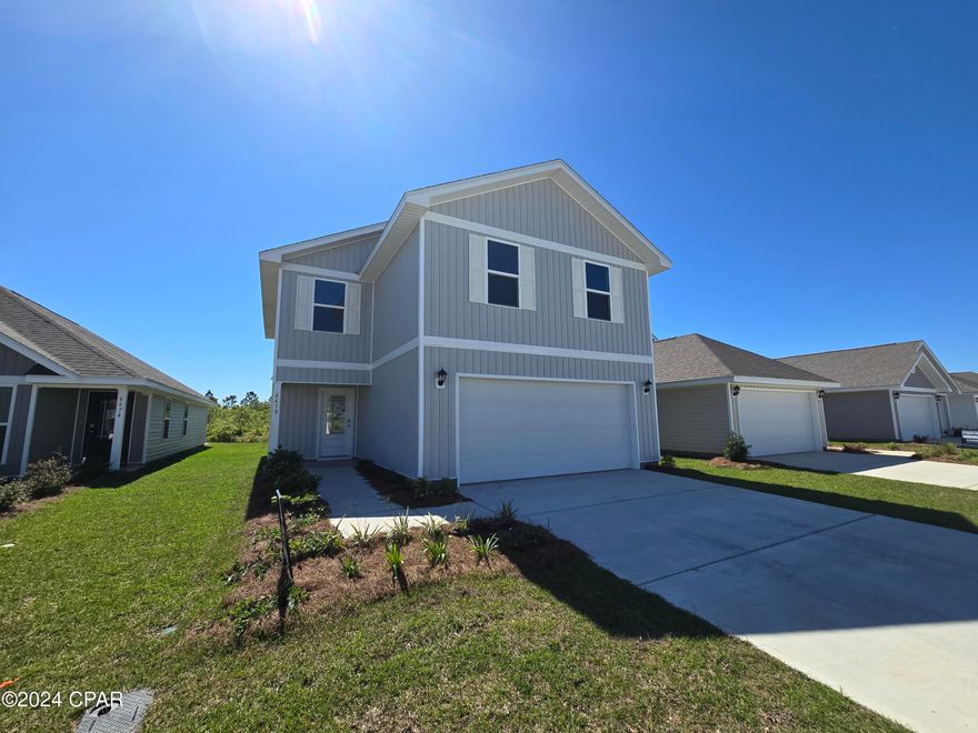 The Aisle floorplan is a two story 4-bedroom 2.5 bath, 1,992 square foot home. As you enter the home through the foyer, you will notice the open floor plan. The downstairs features a kitchen that is open to the large living room and dining area. All bedrooms are located on the second level. The primary bedroom features a large bath with dual sink vanity, a large closet and separate shower and soak tub. Interior features of this home include, beautiful EVP flooring, carpet in bedrooms, durable laminate countertops, white cabinetry, and stainless appliances including a smooth top range, microwave and dishwasher. Liberty neighborhood is conveniently located in beautiful Panama City off Star Avenue near 231. Located just 25 minutes from Tyndall Airforce Base, 20 minutes to hospitals, and less than 15 minutes to shopping, restaurants, and grocery stores. This new lifestyle community offers a 7,500 square foot community center with full gym, wellness room, children's playroom and so much more. Additionally, behind the community center is a water wonderland with resort style pool, splash pads, and an outdoor grilling kitchen with seating.