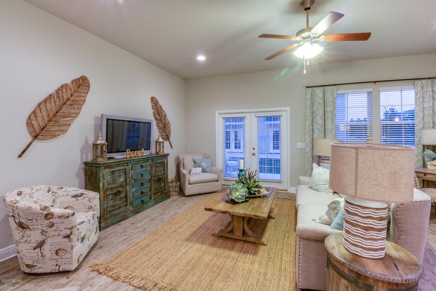 This interior townhome offers 10' ceilings downstairs and 9' ceilings upstairs with Ivory cabinets, Luna Pearl granite, and weathered barnwood luxury vinyl flooring.  An open and spacious floorplan with a huge master suite upstairs with a large walk-in closet and gorgeous master bath with high double sink vanity, garden tub, and beautiful tiled shower.  The secondary bedrooms are spacious as well as the secondary bathroom.