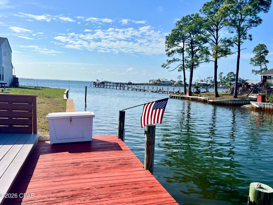 Boat from Your Backyard | Deep-Water Canal | Private Dock | Sunset Views | No HOA

**MORE PICTURES COMING**

Boat from your backyard while enjoying spectacular sunset views from this beautiful waterfront townhome on a deep-water canal with easy Gulf access. Perfectly located in Goose Bayou off St. Andrews Bay, this property offers the ultimate boating lifestyle with a private dock that accommodates up to a 27-foot boat--allowing you to cruise to Shell Island, just 11 miles away, in approximately 25 minutes.

The spacious waterfront deck overlooking the canal is perfect for entertaining, grilling your fresh catch, or simply relaxing while enjoying breathtaking sunsets over the water.

This home offers numerous upgrades and peace of mind including soundproof high-impact storm windows and doors, a durable metal roof, remote-control blinds across the entire back of the home, and a high-efficiency HVAC system with an average electric bill of approximately $160 per month. The three seawalls have also been rebuilt, providing lasting waterfront protection.

Short-term rentals are allowed, making this property an excellent opportunity as a primary residence, vacation home, or income-producing investment.

Enjoy the perfect balance of peaceful waterfront living and convenience. The Panama City Racquet Club is just minutes away, and grocery stores, shopping, and pharmacies are within a 10-15 minute drive. The restaurants, shops, and marina atmosphere of Downtown St. Andrews are only about 15 minutes away.

Best of all -- NO HOA.

If you've been dreaming of keeping your boat behind your home, cruising to Shell Island, and enjoying spectacular waterfront sunsets, this property delivers the coastal lifestyle you've been looking for.

Schedule your private showing today.