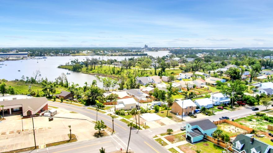 CURRENTLY UNDER CONTRACT. SELLER ACCEPTING BACKUP OFFERS. Beautifully updated 3 bedroom, 2 bath home, with peek-a-boo view of Watson Bayou and within walking distance of Bay Med/Sacred Heart Hospital. New roof 2018, New AC unit 2019, New LVP flooring, fabulous large light & bright kitchen, all white custom cabinets, built-in wine rack, glass front display cabinets, built-in spice rack & large pantry cabinet, quartz counter tops. Whirlpool appliances, dishwasher, stove with double oven and washer & dryer all new in 2019, Refrigerator with ice-maker (new 2018). Large Master bedroom, big walk-in closet, Master bath with double vanity, fully tiled shower with pebble floor, and linen closet. Large fully fenced back yard with patio, fire pit & new outdoor shower! Attached garage and driveway.