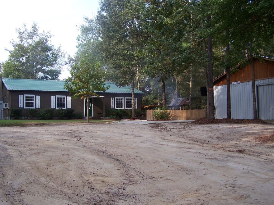 IMMACULATE RUSTIC RETREAT! THIS 2 BEDROOM 1 BATH HOME WITH A LOFT, IS BREATH TAKING. THE HOME BOASTS AN OPEN CONCEPT WITH VAULTED CEILINGS IN THE LARGE LIVING ROOM AND KITCHEN AREA. THE GUEST BEDROOM IS A GREAT SIZE, AND HAS A LOFT AREA IN IT AS WELL. THE MASTER BEDROOM IS GIGANTIC, AND BOASTS A VERY LARGE WALK IN CLOSET. OUTSIDE, SIT DOWN AND RELAX BY YOUR POURED FIRE PIT, OR GO HANG OUT IN THE LARGE BARN. IF YOU FEEL LIKE FISHING, GRAB A POLE AND HEAD DOWN TO THE PRIVATE SPRING FED POND, AND CATCH A MESS OF BREAM. THE PROPERTY ROLLS, AND REALLY GIVES YOU A FEELING OF THE NORTH ALABAMA HILLS. WORDS DON'T DO THIS PROPERTY JUSTICE, SO SCHEDULE YOUR VIEWING APPOINTMENT TODAY!