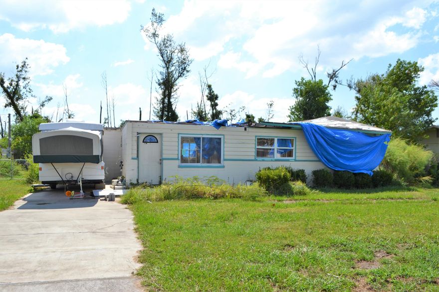 INVESTMENT OPPORTUNITY to redo a 3 bedroom, 1 bath block home. This property has been mitigated to the block walls and studs.  A 2017 HVAC unit is still in the home.  This house has a ranch style layout with an interior laundry room.  The lot is 80x140 and is partially fenced with an open patio.  X Flood Zone.