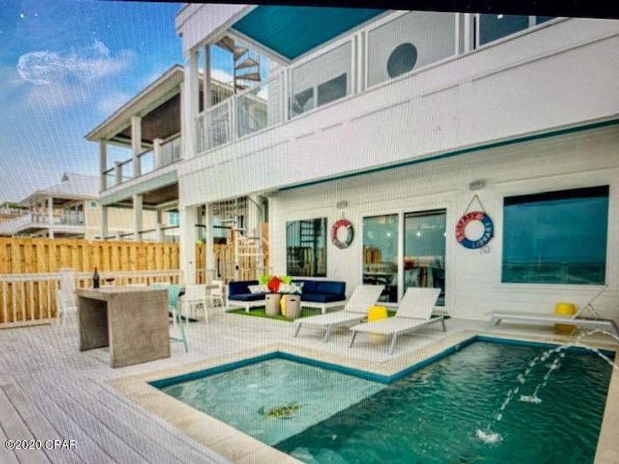 ''Southern Comfort'' sits directly on the East End of Panama City Beach and is located around popular attractions, good eats, and nightlife. This new, luxury home features a heated* pool, a beach walkover, an open concept master suite, outdoor lounge space, foosball table, and everything else you can think of to make your beach getaway beyond comparable.Head up to the second floor and there is a Queen over Queen bunk bedroom with a connected bathroom. There is also a King bedroom on the south side of the home which shares the hall bathroom. There is a King Master bedroom that has an ocean view and direct balcony access. Also on this floor is a second set of a washer/dryer and a common area with foosball table, multiple game tables, and 60'' flat screen TV. Head up to the third floor where there is a large loft common area with a Twin over Queen bunk bed nook as well. The bunk room on the south end of the home features 2 Twin over Twin bunk beds with an additional 2 twin beds on the side, sleeping 6 guests. The third floor master suite is surely breathtaking. It has an open floor concept with a claw tub and luxury stained glass in the bathroom area. You can enjoy the view of Panama City Beach from the glass balcony just off the bedroom. "Southern Comfort" stays true to it's name in every way.  Come explore this incredible investment opportunity today!