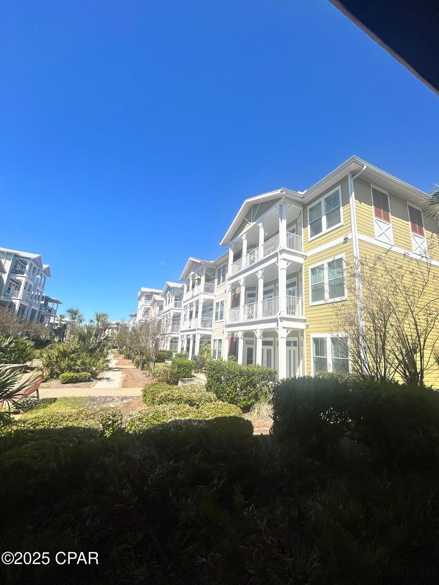 Introducing a stunning 3-bedroom, 2.5-bathroom condo located in the gated community of Panama City Beach, FL. This third-floor unit boasts wood and tile flooring throughout, with carpeted bedrooms for added comfort. The spacious kitchen is perfect for entertaining, while the big master bathroom features a luxurious walk-in shower. Enjoy resort-style living with access to a lagoon pool, hot tub, indoor gym, and theater room. Step outside onto the balcony to take in the courtyard views. Conveniently located near shopping and beach activities, this condo offers the perfect blend of comfort and luxury for your next home.
