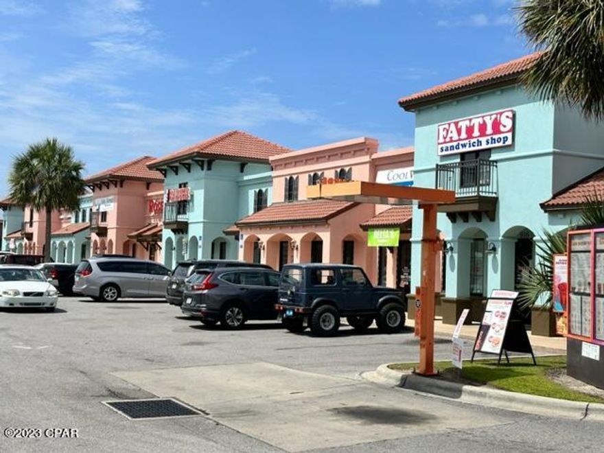 The Coastal Palms Village Strip Center is a Class A, Retail/Office, 16,169 rentable SF building with tremendous upside. The strip center is constructed of concrete poured block and steel beam supported ceilings. The roof is tile and one-piece member of rubber. It is equipped with a complete fire sprinkler system and is monitored on a 24/7 basis. The complex also has ample parking and excellent signage on Thomas Drive. The strip center consists of 10 units with various square footage. Currently 100% of space is occupied. Tenants include Dunkin Donuts, Salty Mermaid, Fatty's Sandwich Shop, Cool Vapors, Nephrology Associates, Fade Away, Fatty Patty's Restaurant and Bakery, and Rose Nails. Current annual income is $307,124. Annual expenses are approximately $71,000.  Current NOI is approximately $236,124.  Cap Rate at 100% leased approximately 6.2. Dunkin Donut unit is equipped with a Drive-Up Window. The exterior of the strip center was recently sealed and painted. 
 Coastal Palms Village is located on Thomas Drive directly across from the Naval Support System. Thomas Drive is the main tourist artery that serves the beaches. Other retail in the area include Burger King, Taylor's Restaurant, Realty One Emerald Coast, as well as LaQuinta Hotel. TREMENDOUS UPSIDE!! SELLER IS OFFERING FINANCING WITH 25% DOWN, PAYMENTS BASED ON A 30 YEAR TERM WITH A 10 YEAR CALL. INTEREST RATE AT 6%.  ADDITIONAL PROPERTY AVAILABLE SEE MLS 666940 AND 666930