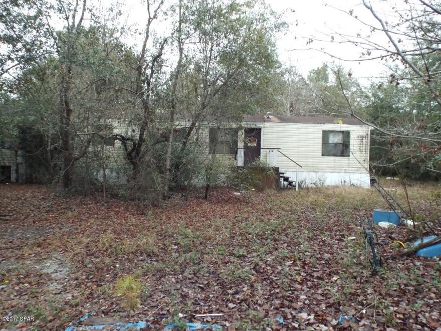 Cute two bedroom two bathroom manufactured home on a .7 acre lot needing some TLC offered as is.  All sizes are approximate or taken for other sources please verify accordingly