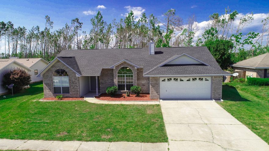 Just in time for summer. Privacy fenced yard with an inground pool for summer fun.This property is located in Callaway Point, and is 10 minutes to Tyndall AFB, Shopping, Restaurants, and many water activities. This home features a large great room with 10 ft. ceilings and a brick fireplace, with a formal dining room, Kitchen with stainless appliances, computer center and a breakfast nook. Large master suite features spacious closets, dual vanities, tub with shower and seperate shower, and a Florida room off of the master suite with access to covered porch. This home has new roof, new paint inside and outside, New tile in the foyer kitchen and hallway, new carpets in all bedrooms and great room. Back yard is privacy fenced, home has a irrigation system with well and pmp.