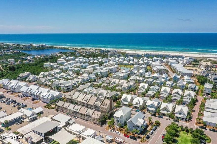 Over $150K in RENTAL ACTUALS: This Bora Bora plan is like no other, with additional square footage added for a custom bunk room allowing the home to accommodate up to 20. 

Welcome to an extraordinary coastal haven in the heart of Prominence South, where luxury and comfort merge to create the ideal beach retreat. This beautifully furnished, five-bedroom, three-and-a-half-bathroom home is rental-ready with annual rental revenue being over $150k per year for the past 5 years. Complete with an elevator, a garage and a golf cart, this residence is designed to accommodate up to 20 guests, making it perfect for large families or savvy investors. 

As you arrive, a charming brick paver driveway and walkway guide you to the entrance. Inside, hardwood floors stretch throughout the spacious main living areas. 

The first floor boasts a massive master suite with a private porch and sitting area, offering a serene escape. A custom-built bunk room with an entertainment space provides the ultimate hangout for kids of all ages.

The second floor is an entertainer's delight, featuring a vast open-plan living area that effortlessly flows into a gourmet kitchen with premium cabinetry, a gas cooktop, a convection oven and modern appliances. A walk-in pantry, powder room, laundry room and a large covered porch complete this level, offering ample space for gatherings.

The third floor houses two guest bedrooms that share a bath and a second master suite with its own sitting area and expansive private porch, perfect for unwinding after a day at the beach. Built for durability and convenience, this home features HardiPlank siding, a metal roof and impact-resistant windows. It also includes a complete smart home tech package with automated systems for lighting, climate control and keyless entry. With its impeccable design, modern conveniences, and prime location by the beach and community amenities, this Prominence South gem is the ultimate investment or vacation retreat on 30A.