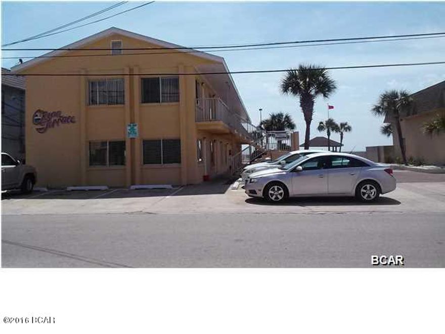 Blast from the past with original terazzo floors! With your nostalgic eye and appreciation that ''what once was old is new again'' you can take this great little  beach side condo and bring it back to life.

Not to mention owner financing is available. Terms to be decided but a minimum of 20% down payment will be required. About 50 steps and you will have your toes in the sand!!