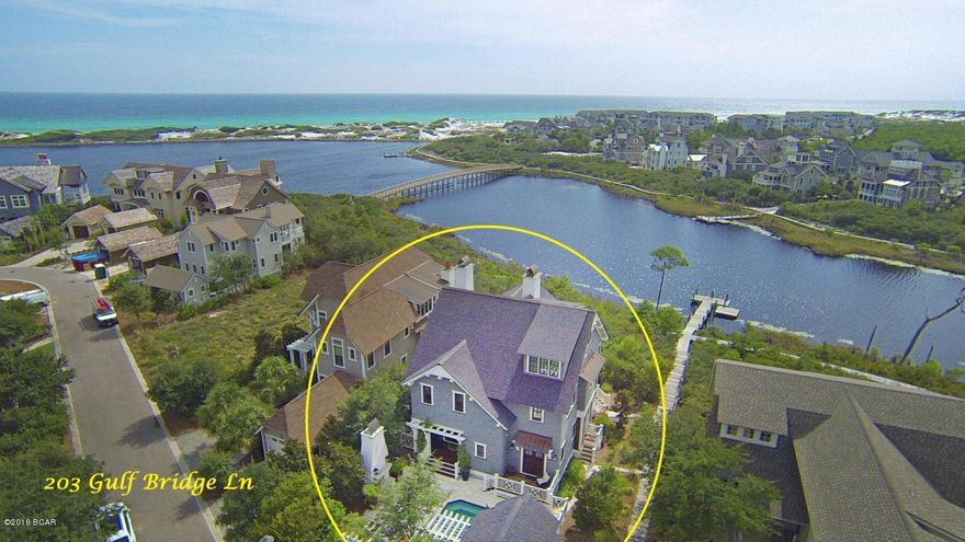 Gorgeous custom beach home nestled alongside Camp Creek coastal dune lake and overlooking sugary white sandy beach dunes and the turquoise waters of the Gulf of Mexico! Enjoy the peaceful and quiet setting of the Peninsula, the most private gated section of Watersound Beach on beautiful 3o-A. Take a stroll or bike ride on pedestrian bridges and boardwalks that meander through the sand dunes, taking you to the beach, community pool and beach club as well as other parts of Watersound Beach. Designed by TS Adams and expertly constructed by Gulfview Construction, great attention was taken in the design and quality and well thought out by the original owners. All materials used are the highest of quality featuring Rinnai tankless water heaters, Lennox HVAC, Ipe decking, Weather Shield windows and doors, Hardiplank Artisan siding, Curry, Hudson Valley and Arroyo Craftsman lighting, Thermador Stainless appliances, Newport Brass plumbing fixtures, spray foam insulation in attic and reclaimed White Oak wide plank floors just to name a few. An additional 1,020sf of Ipe decks and porches add to the quality of this home. You will be greeted by a beautiful private deck/garden area featuring a lovely pool/spa with waterfall, a wood burning fireplace, gardens with outdoor lighting, a built in TV and surround sound system perfect for entertaining guests during those fall weekend football games. Upon entering through a beautiful mahogany front door, you will be greeted by a cozy family room with White Oak floors and wood paneled walls that continue throughout the home. This first level features 3 bedrooms each with its own en suite bath. One bedroom opens to the private pool and deck area while the other two open to a large screened in porch overlooking the beautiful coastal dune lake. The laundry area also has an ice maker, wet bar and small refrigerator for added convenience and leads to the outside enclosed private shower and storage area. A built out elevator leads to all three levels or you can take the beautiful customized staircase. The second level is an open floor plan with a large customized kitchen, featuring Thermador stainless appliances including a 6 burner gas stove, side by side refrigerator, large island/breakfast bar with beautiful granite counter tops, coffered ceilings and a large walk in customize pantry. Looking out from the kitchen through the dining area you will be greeted with stunning views as you relax in the living area featuring raised vaulted ceilings, a built in book case encompassing the large fireplace with a Black Locust mantle. This opens to a large deck area and outdoor grill with continued stunning views of the water and Watersound Beach. A half bath is on this level for convenience and just down the hall is your Master Suite, featuring another fireplace and bookcase, large double doors opening to the large deck with those same wonderful views as you enjoy your morning coffee or a glass of wine while enjoying those beautiful afternoon sunsets. The master suite has its own walk in built out customized closet and the ultimate master en suite featuring a steam shower, Bain Ultra bubble soaking tub, heated limestone floors, his and hers separate vanities with granite counter tops, and makeup vanity with custom mirror. Take the elevator to the 3rd level where you will find a large office, an art studio or bunk room with your same water views, large walk in closet and an additional storage room. This home is also a "Smart Home" with a sophisticated integrated Control 4 System which handles security, lighting and audio/video that you can control from your smart phone or IPad. There is so much to offer you in this home and it is just waiting for the right family. Call today to schedule a showing. Buyer should verify all data and dimensions. Seller is a licensed Real Estate Broker in the state of Missouri. Furnishings are negotiable.