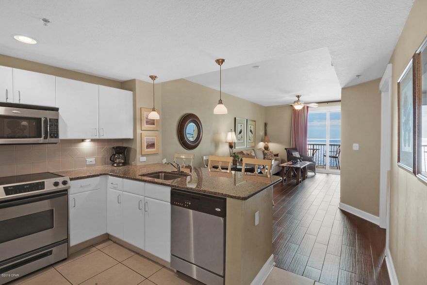 ''CURRENTLY UNDER CONTRACT, SELLER ACCEPTING BACKUP OFFERS This well maintained and move in ready gulf front unit on the 20th floor does not disappoint. Featuring a gulf front master bedroom with forever views, Grand Panama 2008 is perfect for the second home owner or investor looking to maximize cash flow. The Gulf view master bedroom shares a spacious balcony that is also accessible from the living room. The master bath features dual vanities, a tub and separate shower. The gourmet kitchen with breakfast bar features granite countertops and stainless appliances. With 650 feet of beach on the Gulf of Mexico, you can beach it or enjoy one of the many Grand Panama pools, including the beachfront pool, kiddie pool, roof top terrace pool, or two spa pools. The Tiki Bar will keep you refreshed on a hot summer day or after a tough workout at the state-of-the-art fitness center.