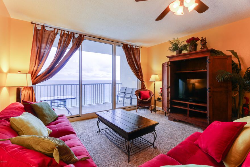 The beach getaway you have always dreamed of - a beach inspired 2/2 Gulf front condo at Majestic Beach Towers. Whether you are ready to live on the beach or invest in a rental property, this is the perfect condo for you! Gorgeous Riveting Gulf views are framed by beachy chic interiors, designed with the Gulf of Mexico and sun in mind. Sunshine and warm gulf breezes abound from the generous balcony, with amazing water and beach views. The gourmet kitchen features loads of cabinet space and is fully stocked and rental ready and the rest of the condo lives larger than its square footage and is spacious and bright. Enjoy the good life at Majestic Beach Resort with resort style amenities including in/out pools, tennis, a large outdoor dining area, impressive fitness facility, community room, the Majestic Movie Theater, the H20 Bar and Grill serving Gulfside lunch and dinner and Majestic Market featuring Starbucks coffee and gourmet sandwiches, etc. This is the ultimate vacation destination! Quick distance to the wonderful shopping, dining and entertainment at Pier Park and the airport.