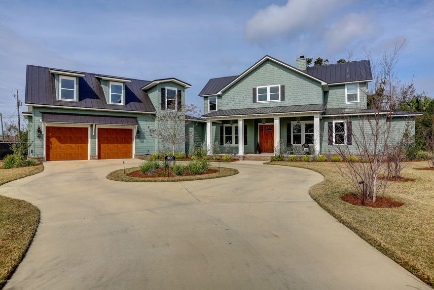 CUSTOM HOME - OSCEOLA POINT - LYNN HAVEN

Beautiful home in one of Lynn Haven's gated subdivisions. Osceola Point boasts immaculate landscaping through the whole neighborhood. This home features a large, welcoming front porch. The interior of this home includes real hardwood floors, LVP flooring in the mud room/laundry room, wood burning fireplace with gas starter in living room, 4 panel sliding glass door leading from the living room to the screened in back porch, quartz countertops throughout the house, & window shades.  The kitchen includes soft close cabinets & drawers, stainless steel appliances, & an over-sized island with a wine cooler built in. The master bedroom has his/hers walk-in closets and the master bath features his/hers vanities, large soaking tub, and huge separate shower Upstairs you will find 2 bedrooms each with their own private bathroom, and a 3rd bedroom that is currently used as an office/playroom. The custom barn doors add character and charm to this already amazing home. There is also a bonus room/5th bedroom above the garage. The tankless gas water heaters provide on demand hot water. Lynn Haven is golf cart friendly and this house has a cart door in the garage.