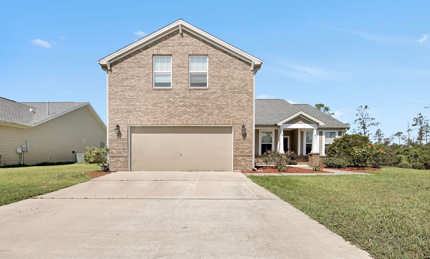 'CURRENTLY UNDER CONTRACT, SELLER ACCEPTING BACKUP OFFERS' Don't miss on the opportunity to check out this move-in ready 4 bedroom, 3 full bath home, located in the desirable neighborhood of Hawks Landing. This home features high, vaulted ceilings in the open and airy living room. The eat-in kitchen showcases granite countertops with stainless steel appliances and pantry for additional storage. There is flex space just as you enter the home that could be used for a home office, play area or formal dining. Downstairs features the master bedroom with tray ceiling and double-vanity ensuite bath that has a tiled shower and seperate tub. Two additional bedrooms downstairs plus full hall bath offer plenty of room to grow or for guests. Upstairs leads to the 4th bedroom, complete with full bathroom option.The home is within close proximity to top-rated schools, dining, shops and ammenities of the City of Lynn Haven. Be sure to schedule an opportunity to preview this property today! All sizes/info/measurements approx; please verify.