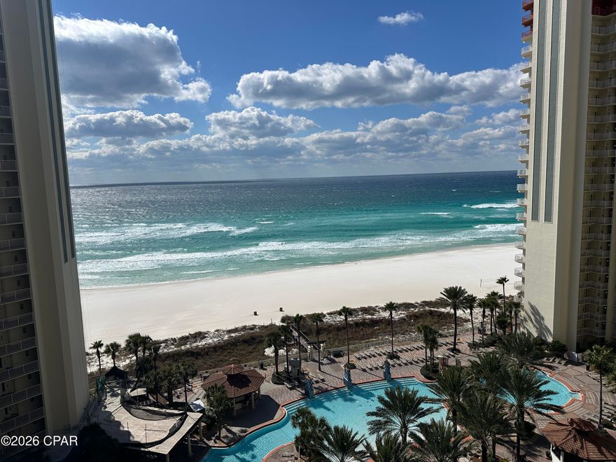 Welcome to the 12th floor at Shores of Panama, where Gulf-front views and strong rental potential come together in this 2-bedroom + bunk room, 3-bath condo that comfortably sleeps up to 8 guests. This condo is perfectly positioned to capture spectacular western-facing sunsets over the Gulf. From your spacious private balcony, enjoy panoramic views of the emerald waters and the resort's iconic lagoon-style pool.

The thoughtfully designed floor plan features two king suites, each with its own ensuite bath, offering privacy and comfort for owners and guests alike. A bunk area with twin beds and a queen sleeper sofa in the living area maximize occupancy and rental appeal.

Inside, the open-concept layout creates a welcoming retreat. The fully equipped kitchen includes granite countertops, and a breakfast bar that flows seamlessly into the dining and living areas—ideal for entertaining or relaxing after a day on the beach. 

This unit conveys with a deeded parking space and is rental-ready, making it an outstanding option for investors or buyers seeking a turnkey Gulf-front getaway. The condo conveys fully furnished and rental-ready, making it an effortless investment opportunity or turnkey beach retreat. This unit also includes one deeded parking space. 
Shores of Panama is home to the largest Gulf-front lagoon pool in Panama City Beach, with its spectacular 14,000+ sq ft zero-entry lagoon pool with palm-lined islands, fountains, and expansive hot tub. tropical palm islands, fountains, and an oversized hot tub—all just steps from exclusive beachfront access. Owners and guests also enjoy:  Indoor heated pool and hot tub, 24-hour fitness center, Seasonal poolside Tiki bar, Covered parking, and On-site security.
The location is unbeatable—walk next door to Pineapple Willy's for beachfront dining or cross the street to Laketown Wharf for multiple dining options including The Wharf Buffet, Juan Taco, and LuLu's Bar & Restaurant. Shopping, entertainment, and attractions are all within easy reach.
If you're looking for a well-positioned Gulf-front condo with proven rental appeal and unbeatable amenities—this is a standout opportunity. With exterior renovations scheduled to enhance curb appeal and long-term value, this is a strategic opportunity to secure this wonderful gulf front condo—ideal as a personal retreat, income powerhouse, or both. All information and HOA details are believed accurate but should be verified by buyers if important.