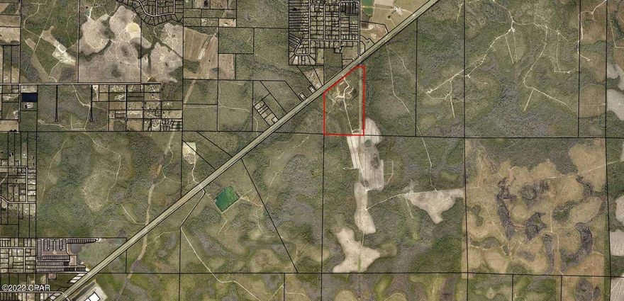 75 acres on Hwy 231. Once used for a sand pit this land is zoned AG-1 Agriculture. This parcel has a lot to offer for hunting, timber and redeveloping. All offers welcome.