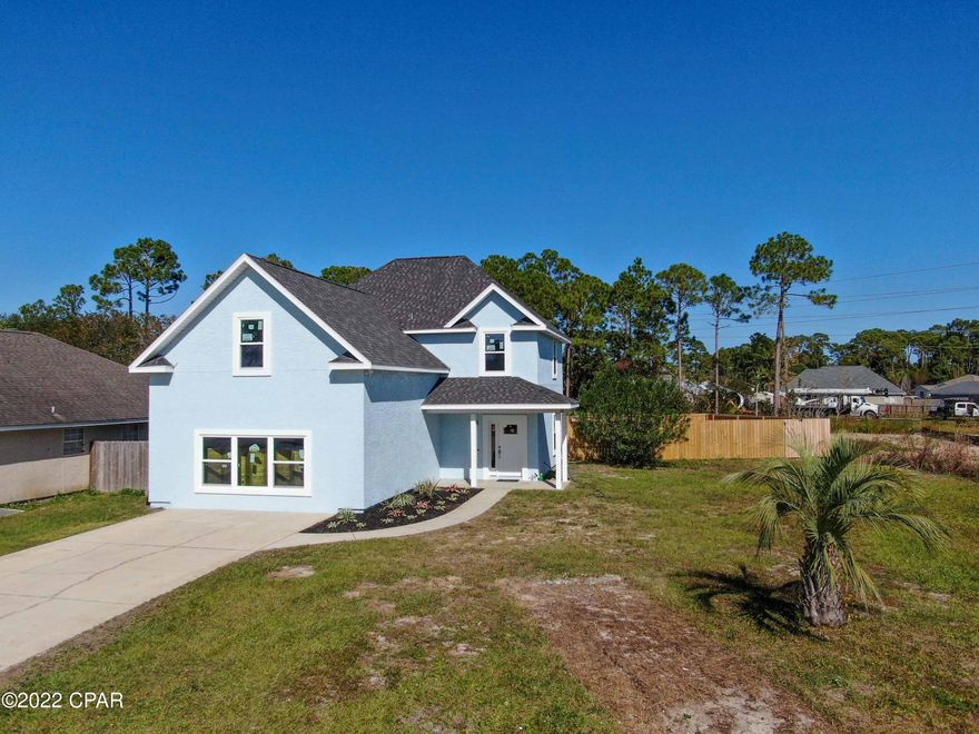 'CURRENTLY UNDER CONTRACT, SELLER WILL CONSIDER BACKUP OFFERS' Here's your chance to own the lowest priced 5-bedroom, 3 full bathroom, pool home on the beach that ALLOWS short-term rentals!!!  This home would make a perfect primary residence or a great short-term rental property for investors.  Located on a cul-de-sac so very little traffic. Completely remodeled from the studs due to Hurricane Michael.  New roof and air conditioner in 2019 and everything else is BRAND NEW.  Seller just received the final inspection on 11/4/22 and living in one bedroom and bathroom.  New kitchen and Samsung appliances.  Privacy fenced in pool with a great covered area for entertaining.  The garage has been converted into a HUGE bedroom with its own mini split air conditioning system.