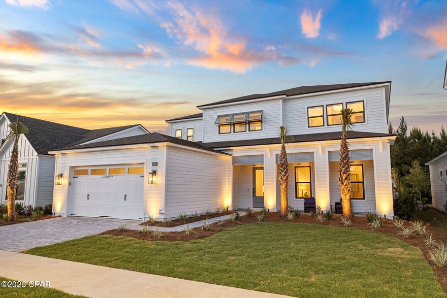 The most upgraded home to ever hit the market in Breakwater at Ward Creek. This 4-bedroom, 3.5-bath, 3,065 sq ft residence on a preserve-backing homesite has been finished years ahead of the standing inventory, with a level of detail that shows better than the model homes. Step into a two-story foyer with 20-foot ceilings, custom beam work, added window and door casing throughout, and a glass-enclosed wine cellar built under the stairs as an architectural feature. 

The kitchen carries KitchenAid appliances, a Thor cooktop, a custom wood vent hood with a top-tier exhaust system, marble counters that replaced all original quartz throughout the home, cabinet toppers, glass bar cabinetry, slide-out drawer systems, and full under- and in-cabinet lighting. The pantry was rebuilt into the largest available in a Toll Brothers floor plan, with custom shelving, marble counter, and a second LG refrigerator. 

Solid wood cabinetry was added in the mudroom, laundry, and primary bath, with new tile backsplashes, a shiplap accent wall, and gold fixtures and hardware carried through the home. Every closet is a custom build-out with drawers and shelving and dedicated lighting. 

The primary suite includes wireless motorized shades and a new dual shower with high-end tile and a custom waterfall design. Behind the home, a full front-and-back makeover delivers a saltwater pool and spa, fire pit with fire bowls, outdoor TV, landscape lighting, all backing to HOA preserve so the view stays yours.

A four-zone security camera system, whole-home WiFi coverage, custom tongue-and-groove porch ceilings, a fresh top-to-bottom interior repaint, and a three-car tandem garage with significant storage complete the home. This is not a project. It is move-in-ready luxury with nothing left to decide. Furniture negotiable.

Breakwater at Ward Creek is a gated community in one of Panama City Beach's strongest growth corridors. Its brand-new clubhouse just opened, with a fitness center, indoor and outdoor living spaces, a zero-entry pool with sun shelf and lap lane, cabana seating, a playground, tennis and pickleball courts, and a large outdoor green space. Nearby, the West Bay Town Center is bringing a new Publix and shopping, a new FSU Health hospital is underway, and a new Intracoastal marina is planned.