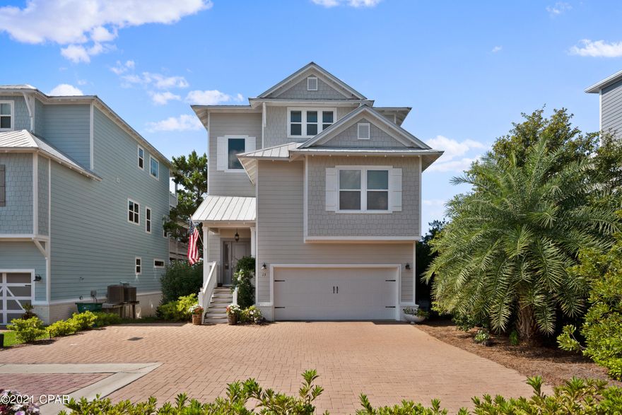 This beautiful three-story beach house with Gulf views from the third level is on a corner lot! Located just off the east end of 30A in desirable Inlet Beach and minutes from the largest beach access in Walton County, 30 Avenue with shopping & dining, Camp Helen State Park, and Rosemary & Alys Beach. This 2,841 sq ft, home features a bedroom, den/bunk room and full bath on the first level, a large bedroom w/ connecting bath the second level, and a third level master retreat with Gulf views. Beautiful hardwood floors throughout the living area of the home, with carpeted bedrooms, and tile floors in all bathrooms & laundry room. First level bedroom and den/bunk room offers direct access to a large covered deck via French doors with direct access to a private backyard, a full bath with walk -in tile shower & granite countertop, and a large laundry room. The common areas are located on the second level along with a third bedroom and full bath. The living area has great natural light as well as recessed lighting. The open dining area features a tray ceiling and direct access to a large partially covered deck with stairs connecting the lower level deck, as well as access to the backyard. The kitchen features Quartz countertops, white sleek cabinetry, a full size sink in the island/breakfast bar, stainless steel appliances & range hood, and a large pantry. The third-level is home to the master retreat. The spacious master bedroom features a tray ceiling and is filled with windows offering fantastic views & great natural light. Just off the master bedroom is the sitting room perfect for a home office, reading nook, or even a home gym. The master bath features double vanities with granite countertops, large soaking tub, a walk-in tiled shower and an oversized master walk-in closet. This home also features a two-car garage and 4 outside parking spaces. The low HOA fee includes the amenities at Grande Pointe which offers a lakefront pavilion, nature paths leading to Lake Powell, the community dock, and swimming pool. The lakefront pavilion features a community room with a full kitchen and conference room, perfect for group gatherings. Just behind the pavilion is a large swimming pool and private dock leading out to Lake Powell. Camp Helen State Park is nearby and also offers a boat ramp with access to Lake Powell and fun outdoor activities such as swimming, kayaking, paddle boarding, hiking, and both freshwater & saltwater fishing can be enjoyed at the park. With the largest public beach access in Walton County (Orange Street) only a short drive away, you'll be relaxing on the pristine beaches with your toes in the sugar-white sand in just minutes!