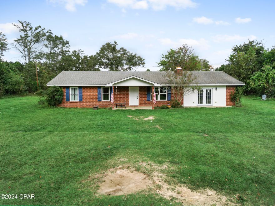 Discover the perfect blend of comfort and opportunity with this charming 4-bedroom, 2-bath brick home set on a spacious 1-acre lot in Blountstown. Surrounded by beautiful trees, this property offers privacy and serenity while being conveniently located near the high school and middle school. Inside, the living room features a cozy fireplace, creating a warm and inviting space for family gatherings. A dedicated laundry room adds functionality, and the family room is a blank slate, ready to be finished to your personal design. Outside, you'll find a covered carport for sheltered parking and a concrete pad, ideal for a future shed or workshop. With ample space and endless possibilities, this home is ready for you to make it your own. Don't miss out—schedule your visit today!
