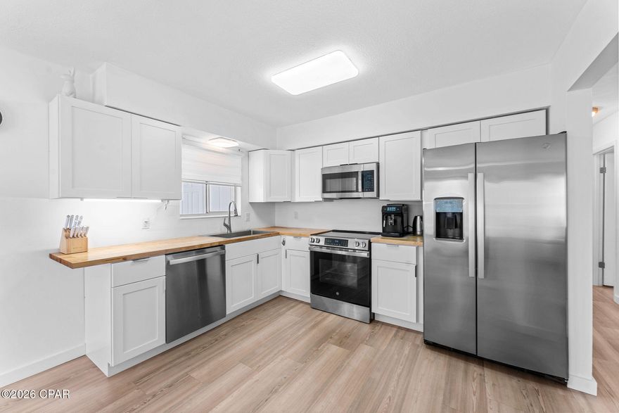 Seller is offering $10,000 Flex Cash for buyer incentives, which may be used toward closing costs, interest rate buy-down, or price reduction .

Beautifully Renovated, Move-In Ready, and Sold Fully Furnished!

Welcome to this beautifully updated home in a quiet neighborhood, perfectly located just minutes from Tyndall Air Force Base and close to local schools, shopping, dining, and everything Panama City has to offer. Whether you are a military family, first-time homebuyer, or simply searching for a modern turnkey property, this home is a must-see.

Renovated in 2025, this home offers stylish updates and thoughtful improvements throughout. Features include brand-new luxury vinyl plank flooring, fresh interior and exterior paint, upgraded closets with sliding doors, and custom shelving and hanging systems designed for optimal storage.

The fully refreshed kitchen features new cabinetry and General Electric appliances, while plumbing upgrades include new toilets, sinks, and faucets throughout the home. Additional improvements include new lighting fixtures, ceiling fans, outlets, and switches, creating a fresh and modern feel in every room.

For added peace of mind, the roof was replaced in 2019, the HVAC system was updated on 06/30/2023 and has been inspected and serviced, and the home also includes a brand-new washer and dryer (2025). The sewer system has been fully inspected and cleaned, and the concrete driveway has been refreshed as well.

Step outside to enjoy the backyard with a convenient outdoor living space.

Fully furnished and truly move-in ready, this home combines comfort, style, and convenience in one exceptional package.