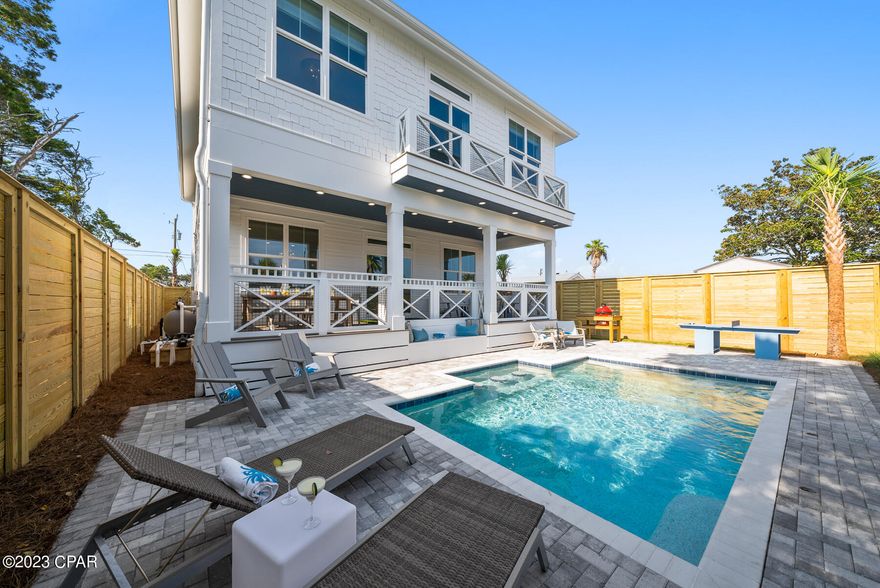 Construction Completed!! Don't miss this opportunity to embrace the coastal lifestyle you've always dreamed of in this upscale West End retreat nestled in the prestigious west end of Panama City Beach, FL. Located south of Highway 98 and within a mere half-mile stroll to the sun-kissed shores, this remarkable property offers an unrivaled coastal living experience. As you step inside this meticulously designed and fully furnished haven, luxury meets comfort. No expense has been spared in adorning this home with high-end brands such as Café Kitchen appliances and top of the line furniture from Bernhardt, Fairfield, Four Seasons, and outdoor furniture from Seaside Casual, ensuring that every detail exudes elegance and sophistication. Immerse yourself in a world of refined opulence, where quality craftsmanship and tasteful finishes combine to create an ambiance of pure indulgence. This remarkable residence offers an exceptional opportunity, whether you're seeking a lucrative vacation rental or a dream home for yourself. This stunning property seamlessly combines the allure of a high-producing vacation retreat with the comfort and charm required for everyday living.