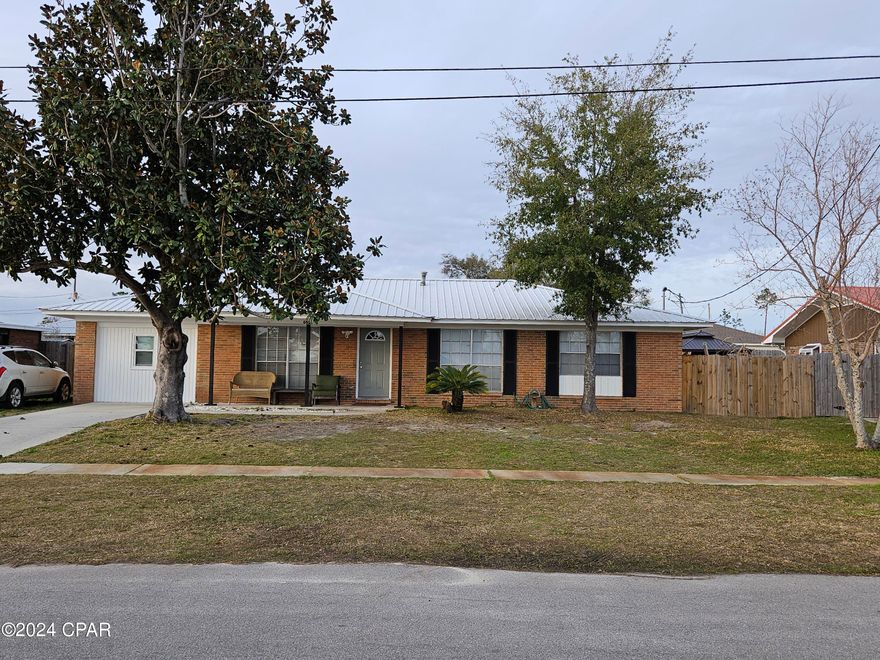 Beautiful property, completely remodeled less than three years ago, with three bedrooms and a bonus room. The kitchen features shaker cabinets with waterfall granite countertops and there is also a 60'' kitchen island with decorative lighting. Both bathrooms have been completely remodeled with a new tub and tile surround in the hall bathroom and a fully tiled shower in the master bathroom. Other items replaced in the last three years; New metal roof, water heater, HVAC system, interior doors, exterior doors and the list goes on.