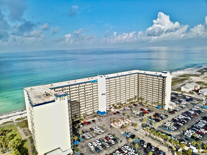 CURRENTLY UNDER CONTRACT, SELLER ACCEPTING BACKUP OFFERS'

This immaculate condo is a must see! Located on the quiet end of PCB close to entertainment, St Andrews State Park, shopping, and some of the best restaurants available. This renovated gulf front condo combines the beachy feel with modern luxury. Entertain in style with over 1,100 square feet of comfortable living space and plenty of windows allowing natural light to flow throughout the unit's open, airy layout. Highlights include tile floors that flow throughout the unit, new paint, new furniture, and endless views of the Gulf. Enjoy your evenings relaxing on the 10th floor balcony while you take in the breathtaking Florida sunsets. The spacious kitchen is certain to bring out your inner chef, with quartz countertops, new cabinets, and a breakfast bar, you'll enjoy making your favorite meals. Both bedrooms have a private full-size bathroom with updated vanities, quartz countertops, and beautiful tile showers. The gulf front bedroom with a private access to the balcony is perfect for resting and listening to the sounds of the waves on the shore. Don't feel like going anywhere? The amenities will keep you busy for hours on end including a tiki bar, two gulf front pools, hot tub, lawn area, sunbathing deck, fitness center, game room, BBQ grills, and more. This unit is a must see! Call to schedule your showing today!