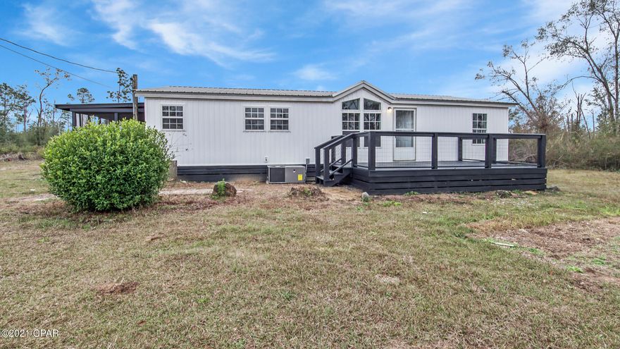 CURRENTLY UNDER CONTRACT, SELLER ACCEPTING BACKUP OFFERS ... WOW!!! You don't want to miss this absolutely  beautifully renovated home in Youngstown. Situated on just over an acre, this lovely property offers indoor and outdoor space for everyone! This almost 1300 sq ft home feels much larger - has a ton of living space with a huge open great room, split bedroom plan, designated dining room, breakfast area with breakfast bar in the kitchen - breakfast area opens out to the huge 20'x10' screened porch! The kitchen also features new soft close cabinetry, quartz countertops, pantry, and plenty of storage! The laundry area is tucked out of the way close to the side door.  The master bedroom is lovely with barn door entry into the bathroom and a 12' long step in closet! Wrap around decks, separate carport/shed, new well house! This one has it all!!! All sizes approximate and taken from public records. Buyer to verify any details buyer deems important. Seller has not occupied the house - renovation has just been completed.