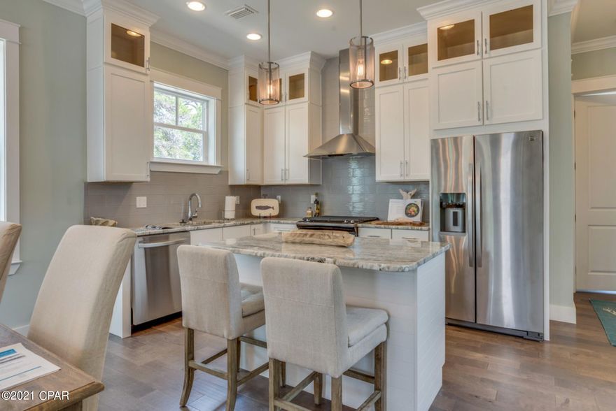 Welcome to LAGOON MANOR community, a quaint New Orleans inspired cul-de-sac of 12 unique 'to be built' homes! **POTENTIAL INVESTMENT OPPORTUNITY!**ONLY 0.5 MI TO PUBLIC BEACH ACCESS 24! This neighborhood sits right by the beautiful SIGNAL HILL GOLF COURSE! Enjoy close proximity to tons of family-friendly and nightlife entertainment in the heart of Panama City Beach! The 'Madeline'' house plan offers a spacious and functional open floor concept on the main floor with 4 bedrooms on the 2nd story. Additional features of the home include a galvanized steel metal roof, GE stainless steel appliances, linen closet/storage, 10ft ceilings, granite sinks, Luxury Vinyl Plank flooring and more! Lots of upgrade options available! *Images are of similar built home*