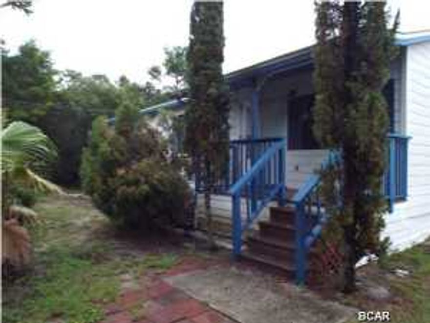 REDUCED!!! Three bedroom Two bathroom home on a quarter acre lot, near the beach with new carpet, AC, paint, and roof offered as is. All sizes approximate please verify if important.