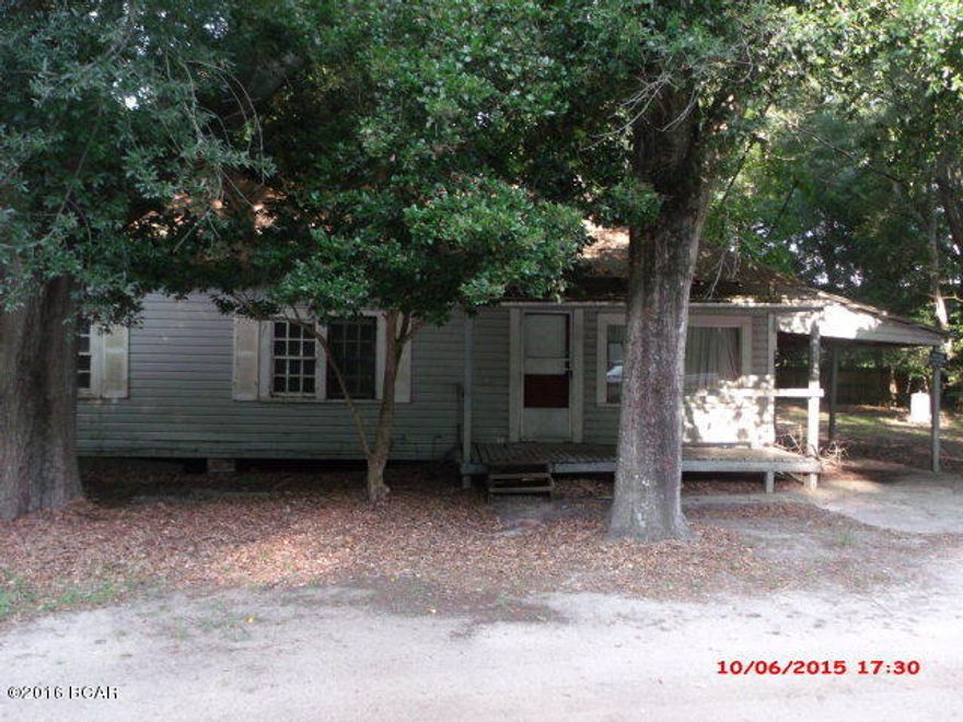Fixer upper, older home on corner lot.