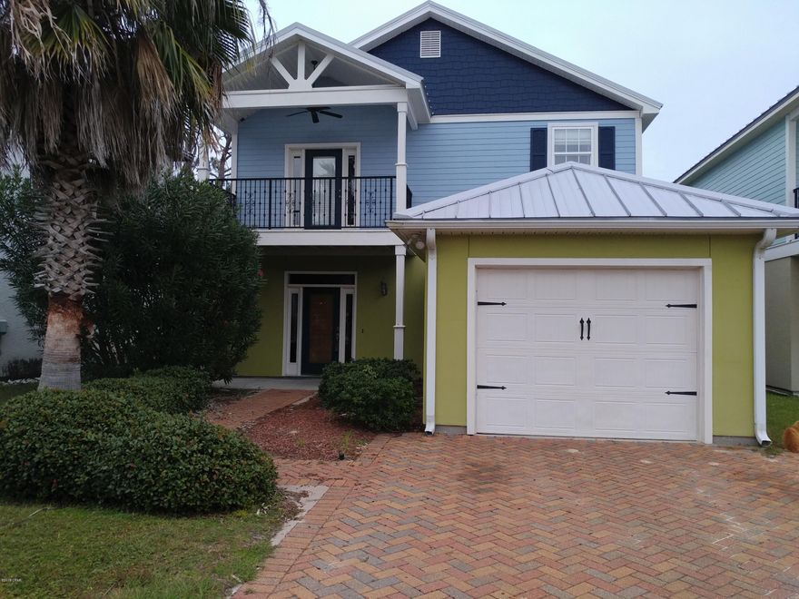 This stunning 4 bd 3ba craftsman home has an open floor plan with large living area. New paint and new carpeting throughout. The exterior paint just recently finished.  Kitchen is beautifully appointed with granite countertops, stainless steel appliances. One of the bedrooms is conveniently located on the first floor, with three  additional bedrooms on the second. There is a large balcony off the master bedroom from which to watch the sunset. Master bath has separate Jacuzzi tub and shower. Jack and Jill bath for other 2 bedrooms. This home features a fenced in patio area, garage and paver driveway. Hidden Lagoon Villas offers a community pool, clubhouse, and barbeque area. Great location close to the beach, restaurants, entertainment and Navy Base. Just a short 2 miles to the sandy beach.