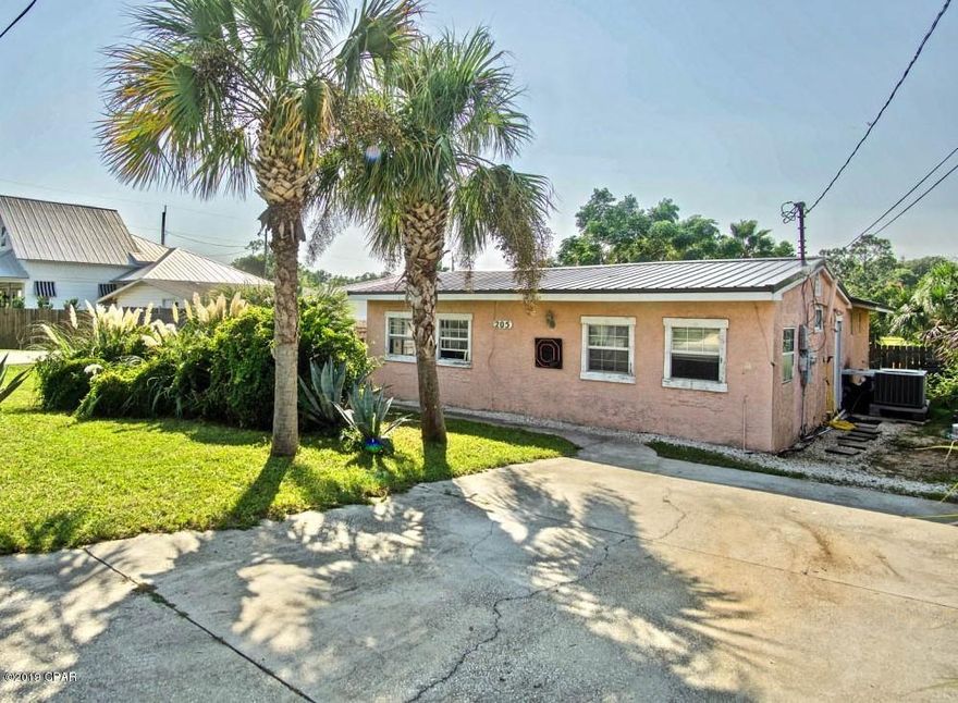 CURRENTLY UNDER CONTRACT, SELLER ACCEPTING BACKUP OFFERS. Less than 800 feet to Public Pier 83 and the sugar white sand of The World's Most Beautiful Beaches! This amazing beach home is perfectly located to everything Panama City Beach has to offer. Being a golf cart friendly community, you're literally seconds from jumping on your cart and enjoying the sun, sand and cold drink in your hand. With a new metal roof put on 2 years ago and several interior upgrades recently made, your new beach home is move in ready. Finding a gem like this one is rare, so call us today for a private showing!