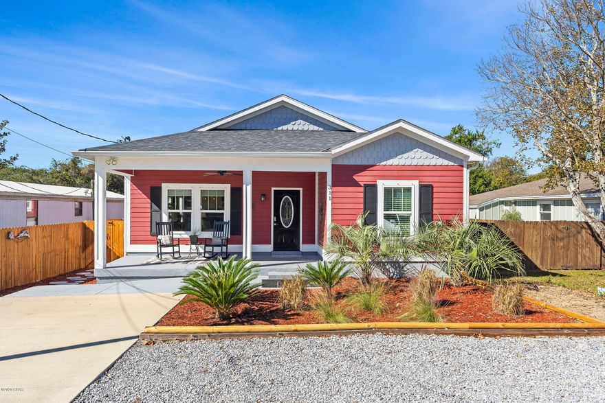 FANTASTIC RANCH HOME WITHIN THE SHORT TERM RENTAL AREA! there is nothing you need to do but bring your toothbrush! beautifully decorated, nice rental property or perfect second home!  gorgeous master bedroom/master. oasis in the backyard with a screened porch, beautiful landscaping, outdoor shower, storage sheds full of beach toys,bikes ect. this one you can just move into! love the concrete flooring thoughout. you just have to see this one to realize all that it offers.