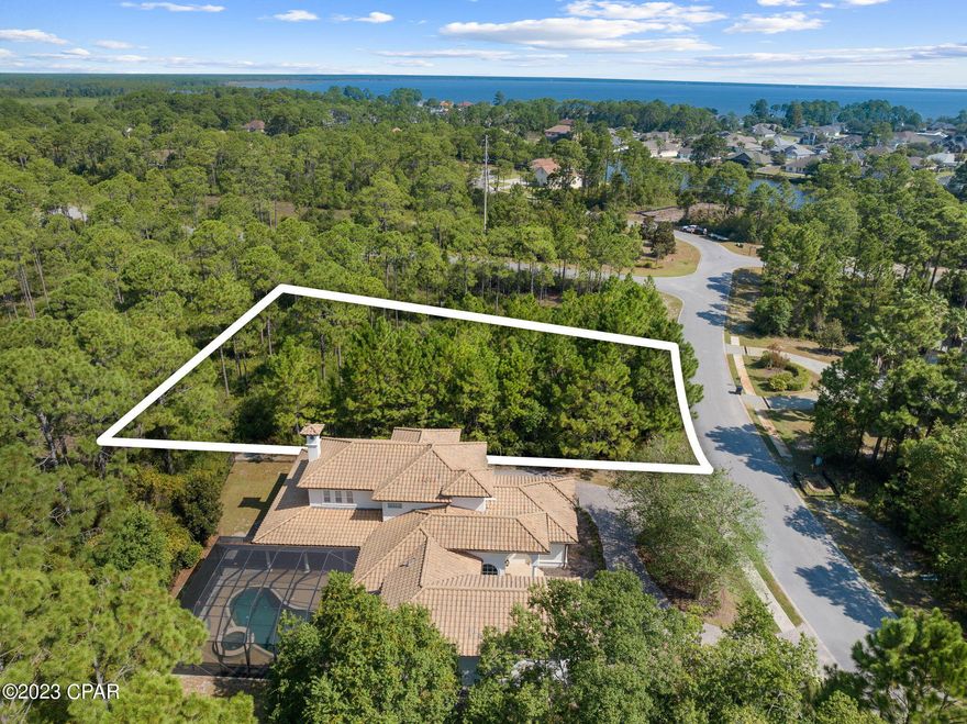 Build your DREAM HOME within the exclusive Trieste gated community in the heart of Panama City Beach. This is more than a residence; it's a statement of refined living, offering a harmonious blend of opulence, comfort, and convenience. Living in Trieste means access to a world of exclusive amenities. Enjoy hiking or indulge in a round of golf.