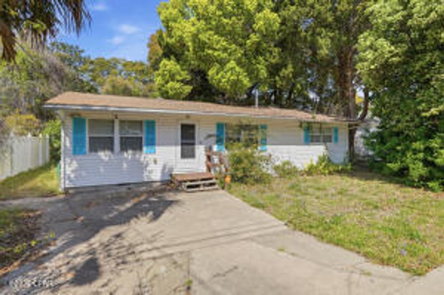 CALLING INVESTORS - this 2-bedroom, 2-bath fixer-upper offers an incredible opportunity to create your ideal coastal retreat or income producing property. This home features a functional layout with spacious living and dining areas, ready for your personal updates and vision. Both bedrooms offer ample space, with two full bathrooms providing added convenience for guests or future tenants. The roof was replaced in 2013, Water Heater 2025,
giving you a solid starting point as you focus on cosmetic upgrades and improvements. Perfect for investors looking for a strong STR location, flippers, or
buyers looking to customize their own home.