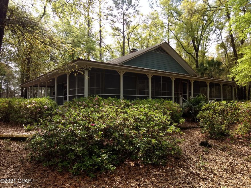 Currently under Contract, Seller accepting backup offers. Beautiful home in a park like setting, overlooking a large pond. Very well kept home is in great condition. Large wrap around porches on 3 sides, one side is screened. Features, vaulted ceiling, wood burning stove, very nice kitchen with stainless steel appliances, fireplace in master bedroom, large bath with whirlpool tub and a separate shower. Out side you will find a fully enclosed, heated swimming pool. Property fronts on a large pond with plenty of fish. Property extends out into the water, you can build your own dock. Make an appointment to see today.