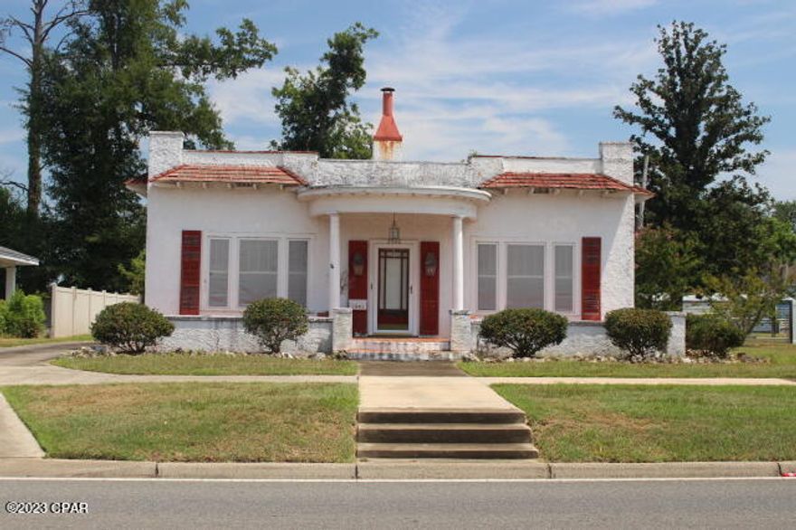 'CURRENTLY UNDER CONTRACT, SELLER WILL CONSIDER BACKUP OFFERS'  Street to street access to this property and being zoned Mix Use is a prefect location for your small business on busy Jefferson St.  Even room to build on the back side with the access on Madison St.  Endless possibilities.  You love older homes, here's a good project to restore to it's former glory. Original hardwood flooring and windows. No other home with it's looks and exterior design in the area.  The lot on Madison St has city water hookup only and  water lines attached for inexpensive watering for your garden & plants.