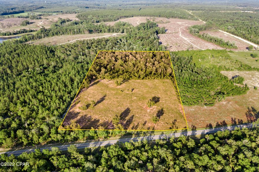 Wow! Great opportunity to own 14 acres on a paved road.  This parcel is partially cleared.  The possibilities are endless!